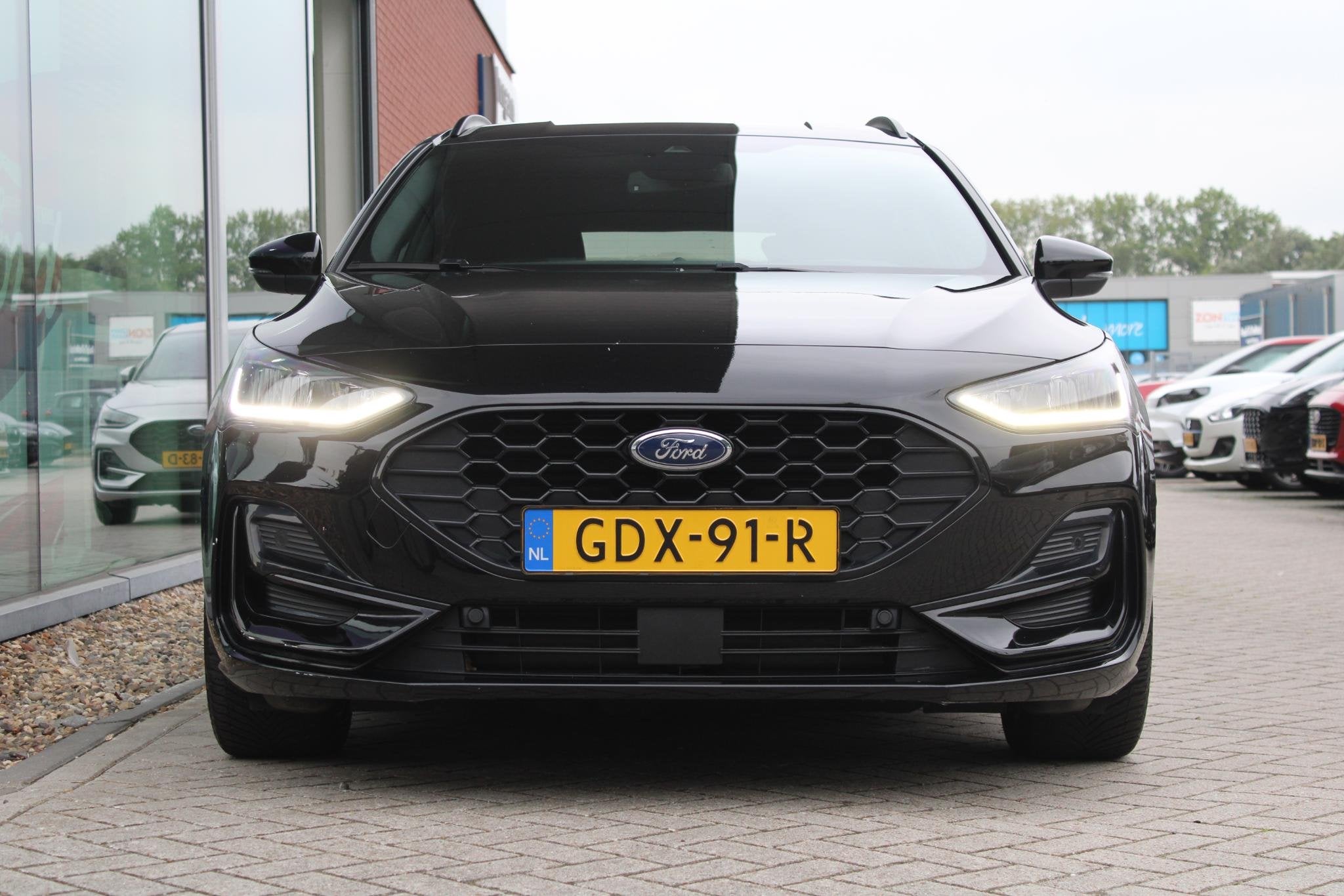Ford Focus Wagon 1.0 EcoBoost Hybrid ST Line X 155pk Automaa, Auto's, Stof, Gebruikt, Euro 6, Zwart