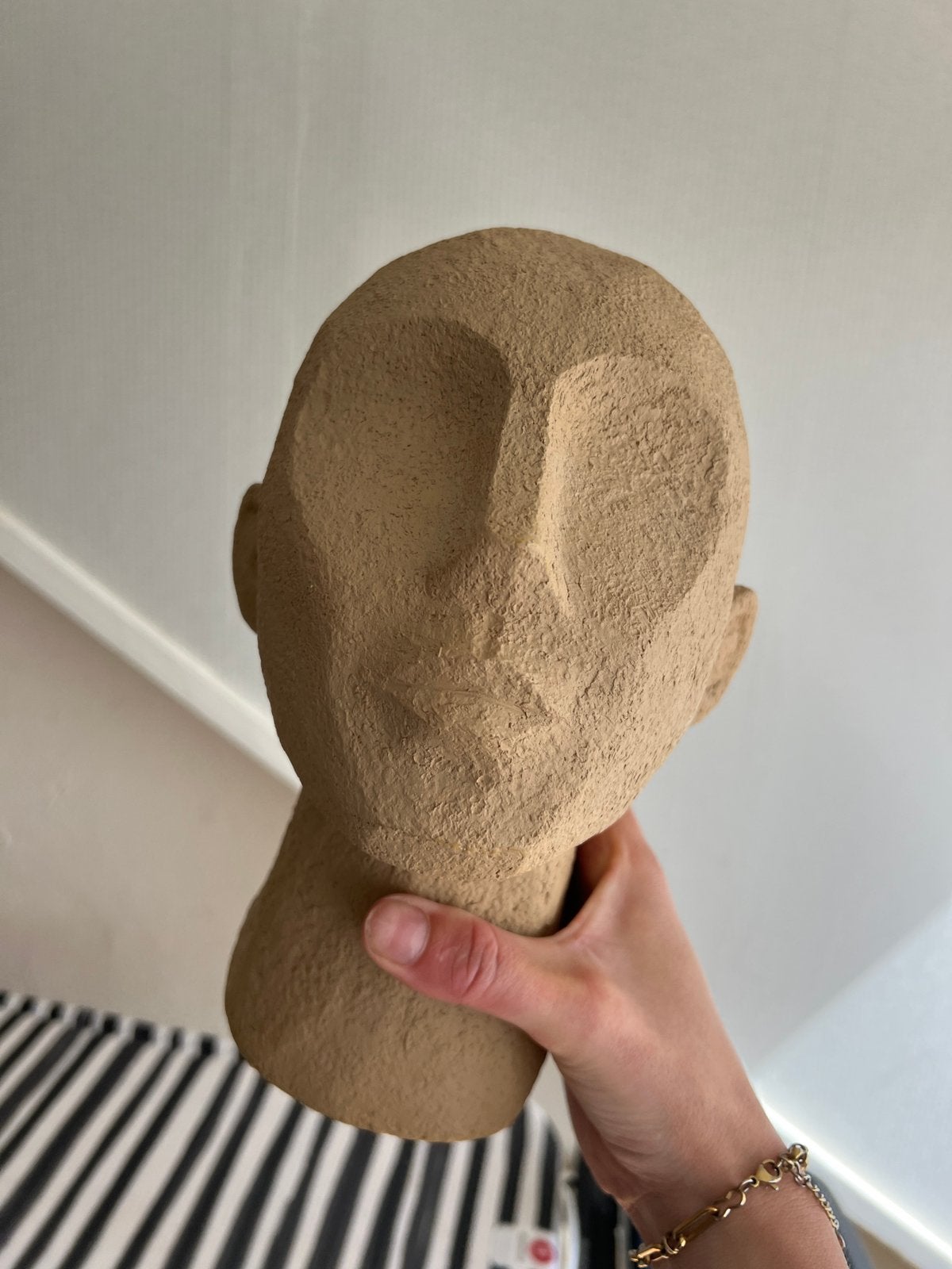 Beeld hoofd coco maison, Ophalen