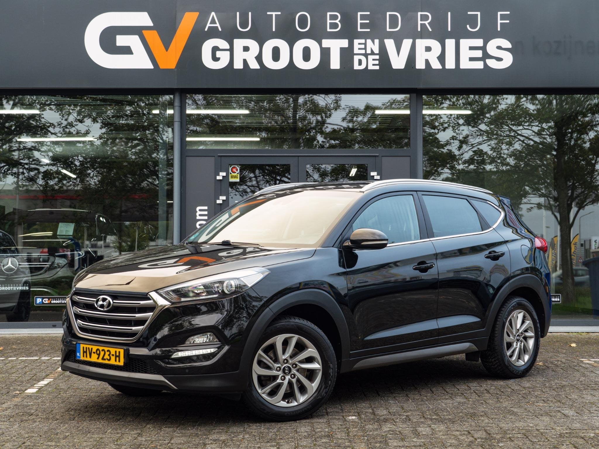 Hyundai Tucson 1.6 GDi Comfort|Orig NL|Navi|Trekhaak|Camera, Auto's, Voorwielaandrijving, Stof, Gebruikt, 4 cilinders