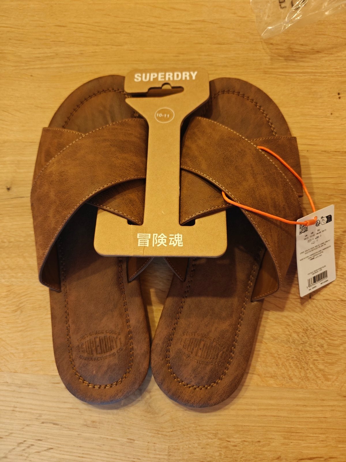 Nieuwe Superdry leren slippers - Maat 44-45, Slippers, Bruin, Nieuw, Ophalen of Verzenden