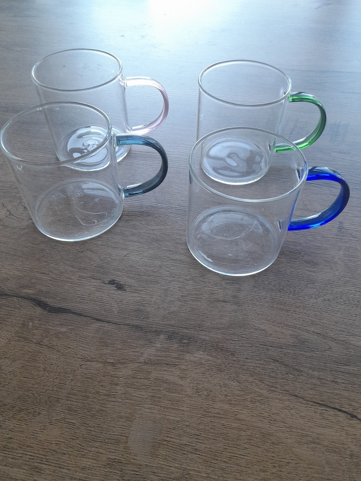 4 theeglazen met gekleurd oortje, Huis en Inrichting, Keuken | Servies, Glas of Glazen, Ophalen of Verzenden, Overige stijlen