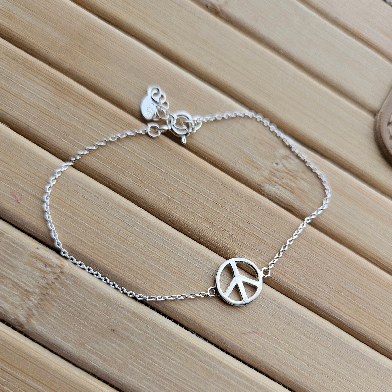 Sterling zilveren peace bedelarmband, Ophalen of Verzenden, Zo goed als nieuw, Met bedels of kralen, Zilver