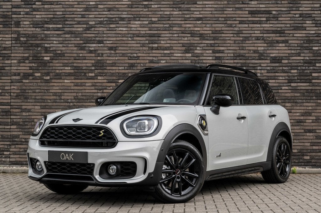 MINI Countryman 1.5 Cooper SE Hybride ALL4 JCW-Trim | Naviga, Auto's, Mini, Automaat, 12 maanden, Gebruikt, Zwart