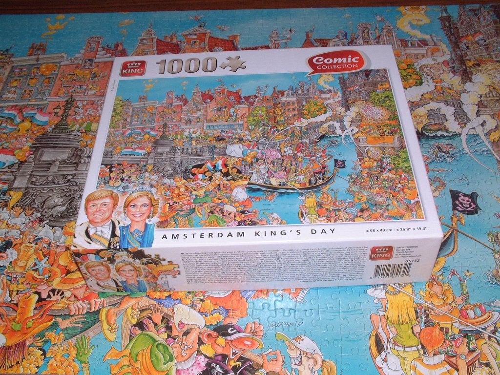 puzzel st.1000 Amsterdam King's day - comic collection King, Ophalen of Verzenden, 500 t/m 1500 stukjes, Zo goed als nieuw, Legpuzzel