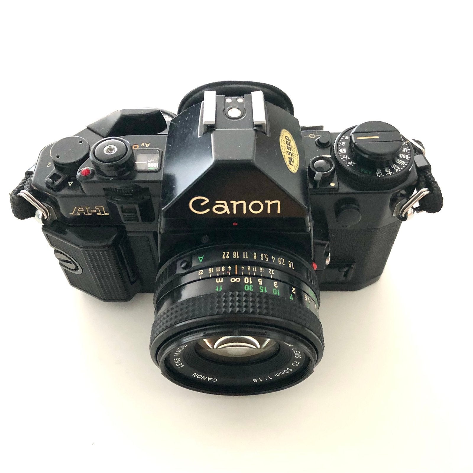 Canon A-1 Spiegelreflexcamera met 50mm f/1.8 lens, Audio, Tv en Foto, Fotocamera's Analoog, Ophalen of Verzenden, Gebruikt, Spiegelreflex