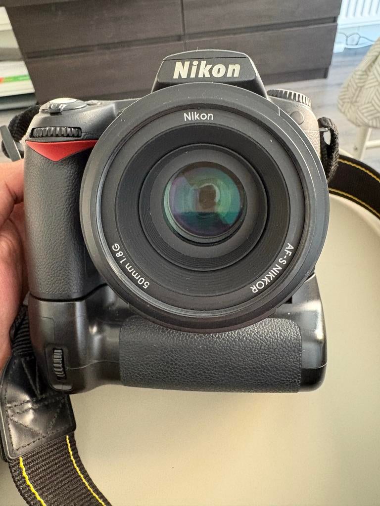 Nikon D90 met 50mm f/1.8 lens en batterij grip, Gebruikt, Spiegelreflex, Ophalen of Verzenden, Nikon