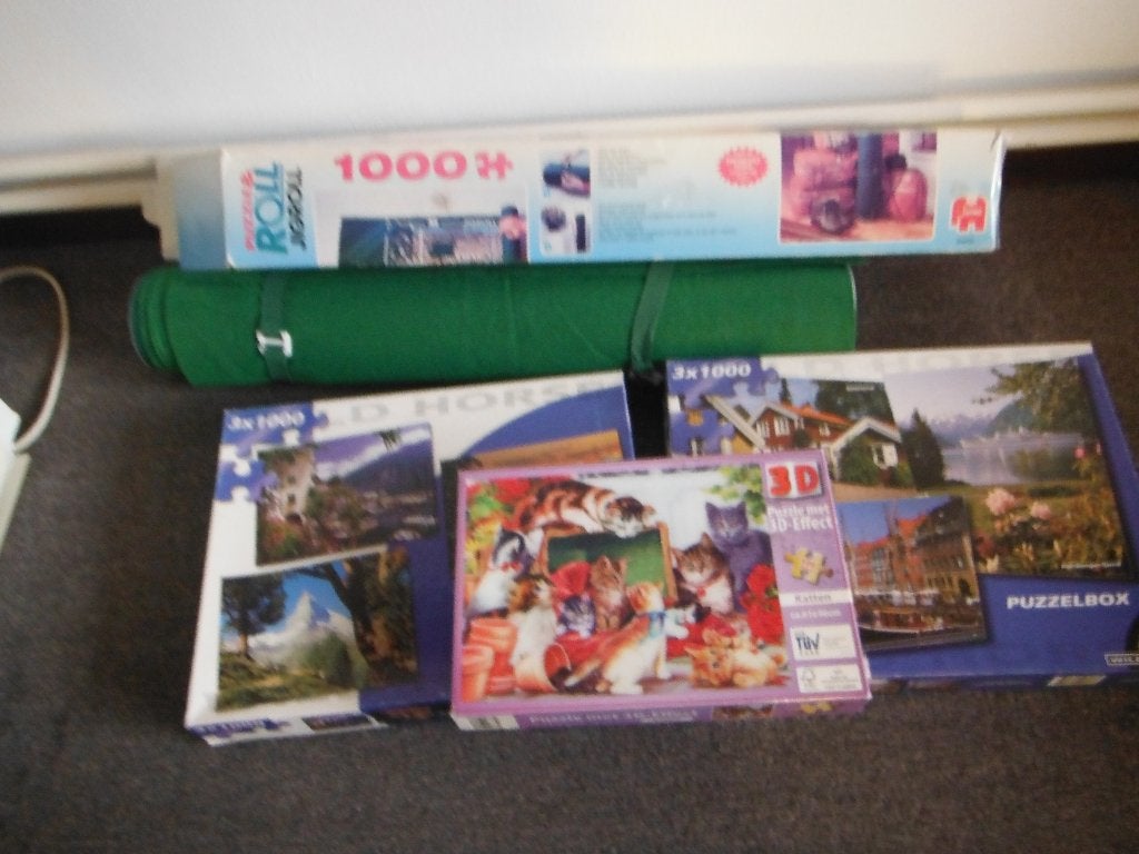 puzzselmat met totaal 8 puzzels, Ophalen, 500 t/m 1500 stukjes, Gebruikt