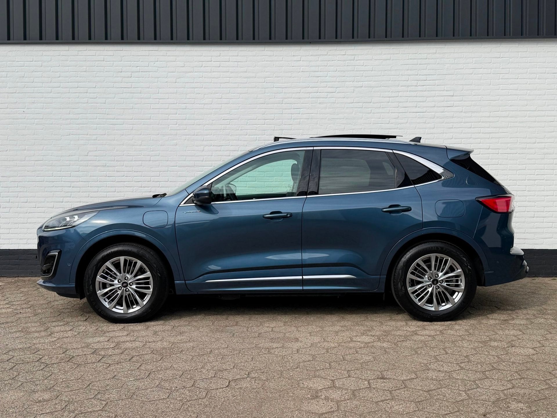 Foto 2 van Ford Kuga 2.5 PHEV Vignale PANODAK l ACC l B&O l TREKHAAK