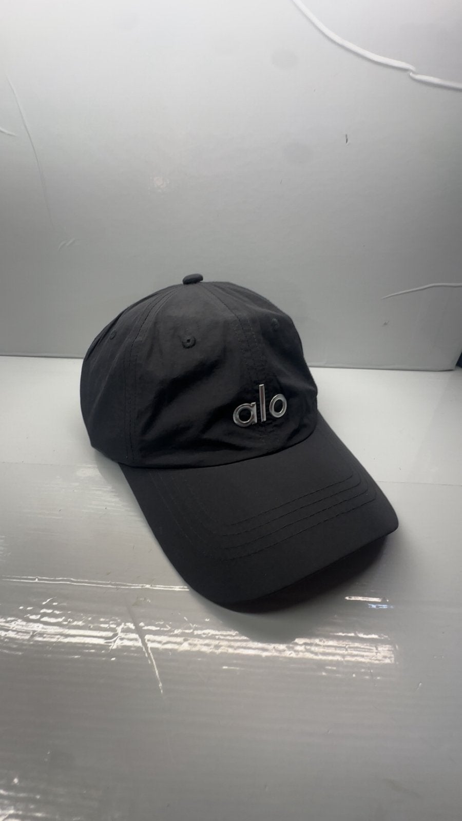 Alo pet zwart, Kleding | Heren, Ophalen of Verzenden, Zo goed als nieuw