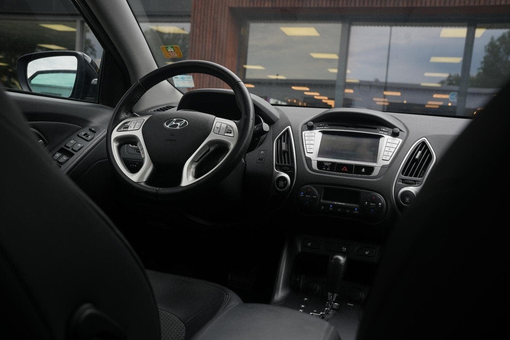 Hyundai ix35 2.0i i-Catcher Panoramadak Cruise Clima 4x Stoe, Auto's, Hyundai, Gebruikt, Parkeercamera, 4 cilinders, Leder