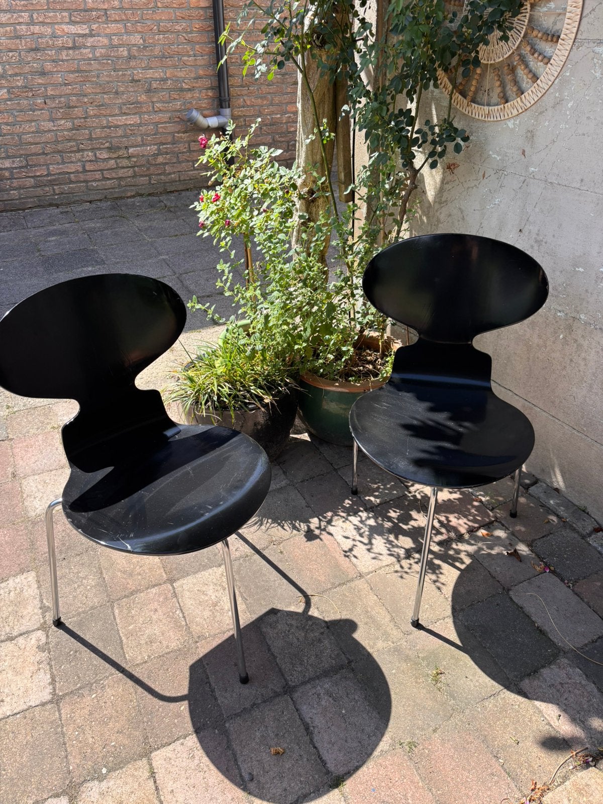 Set van twee Fritz Hansen Vlinderstoelen met 3-poot, Huis en Inrichting, Ophalen, Gebruikt, Twee, Zwart