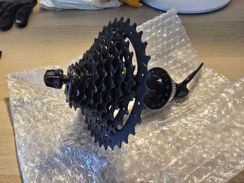Shimano 8 speed krans met snelspanner te koop, Fietsen en Brommers, Fietsonderdelen, Ophalen of Verzenden