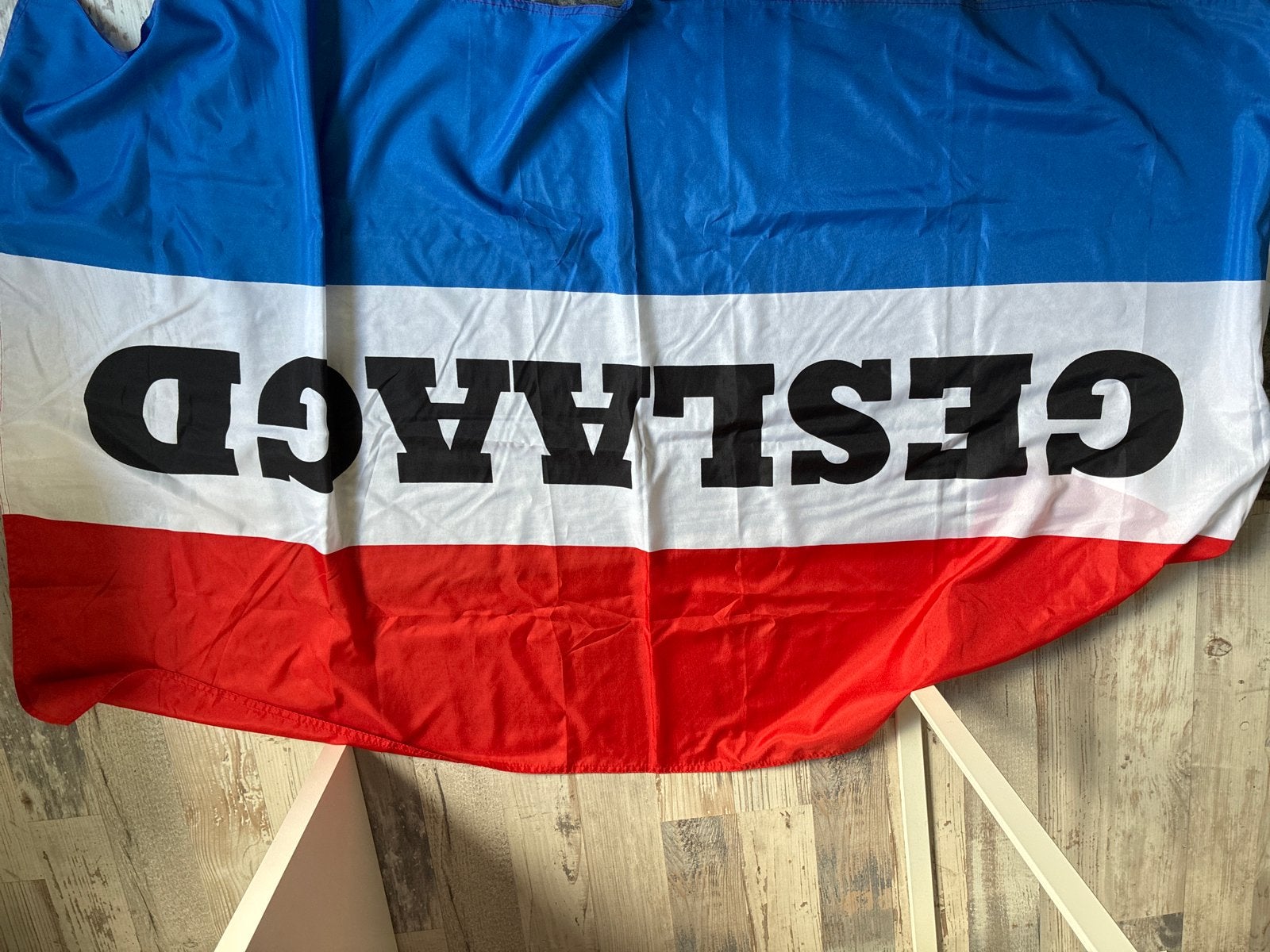 Geslaagd vlag, Ophalen