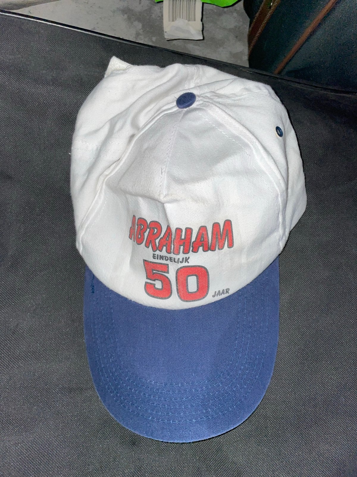 Pet 'Abraham Eindelijk 50 Jaar' - Wit/Blauw, Ophalen of Verzenden, Zo goed als nieuw, One size fits all, Pet