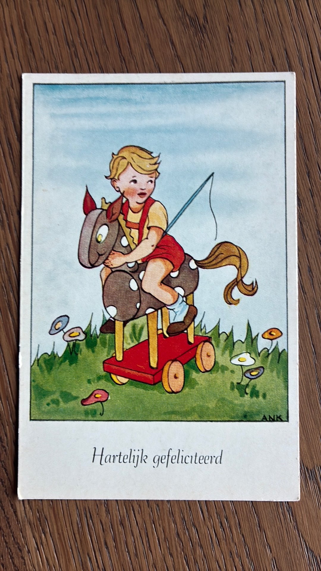Kind op houten paardje. Gesigneerd ANK, Verzamelen, Ophalen of Verzenden, Ongelopen, Kinderen