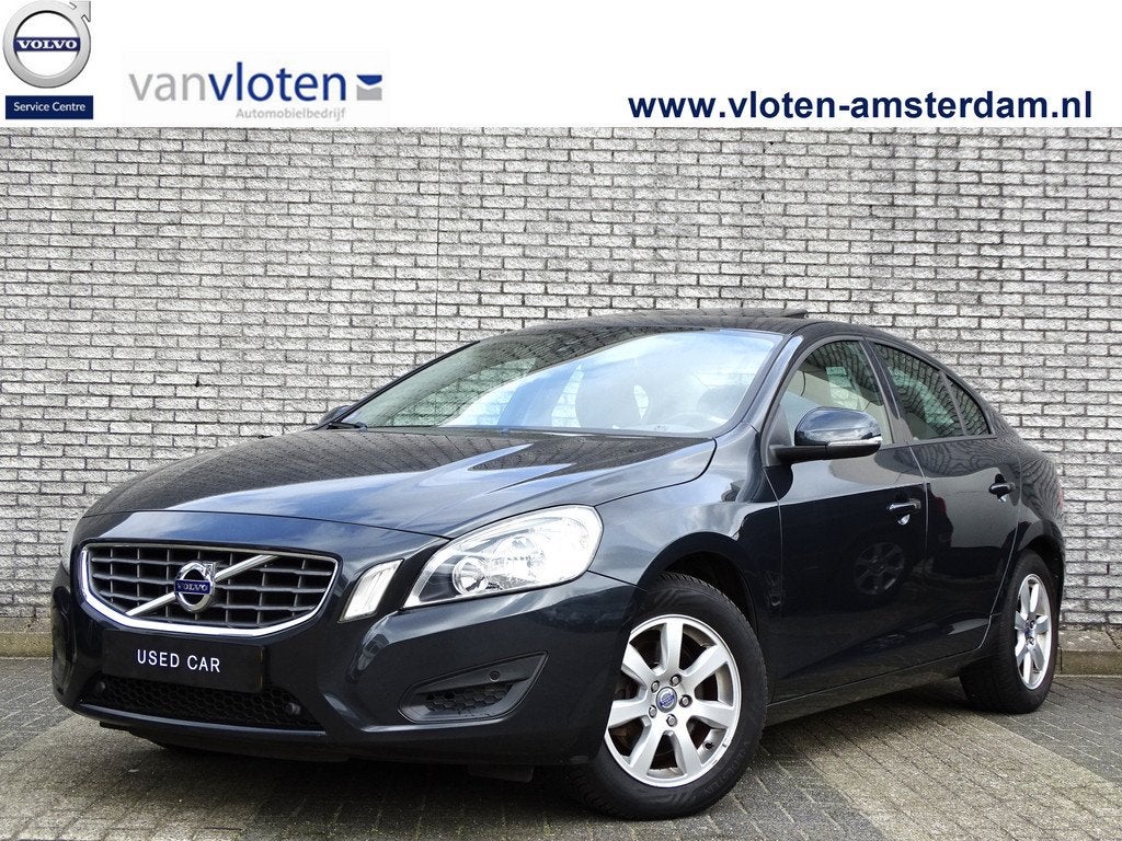 Volvo S60 1.6 T4F Kinetic | Leder | Trekhaak | Schuif- / kan, Auto's, Gebruikt, Zwart, Met garantie (alle), 179 pk