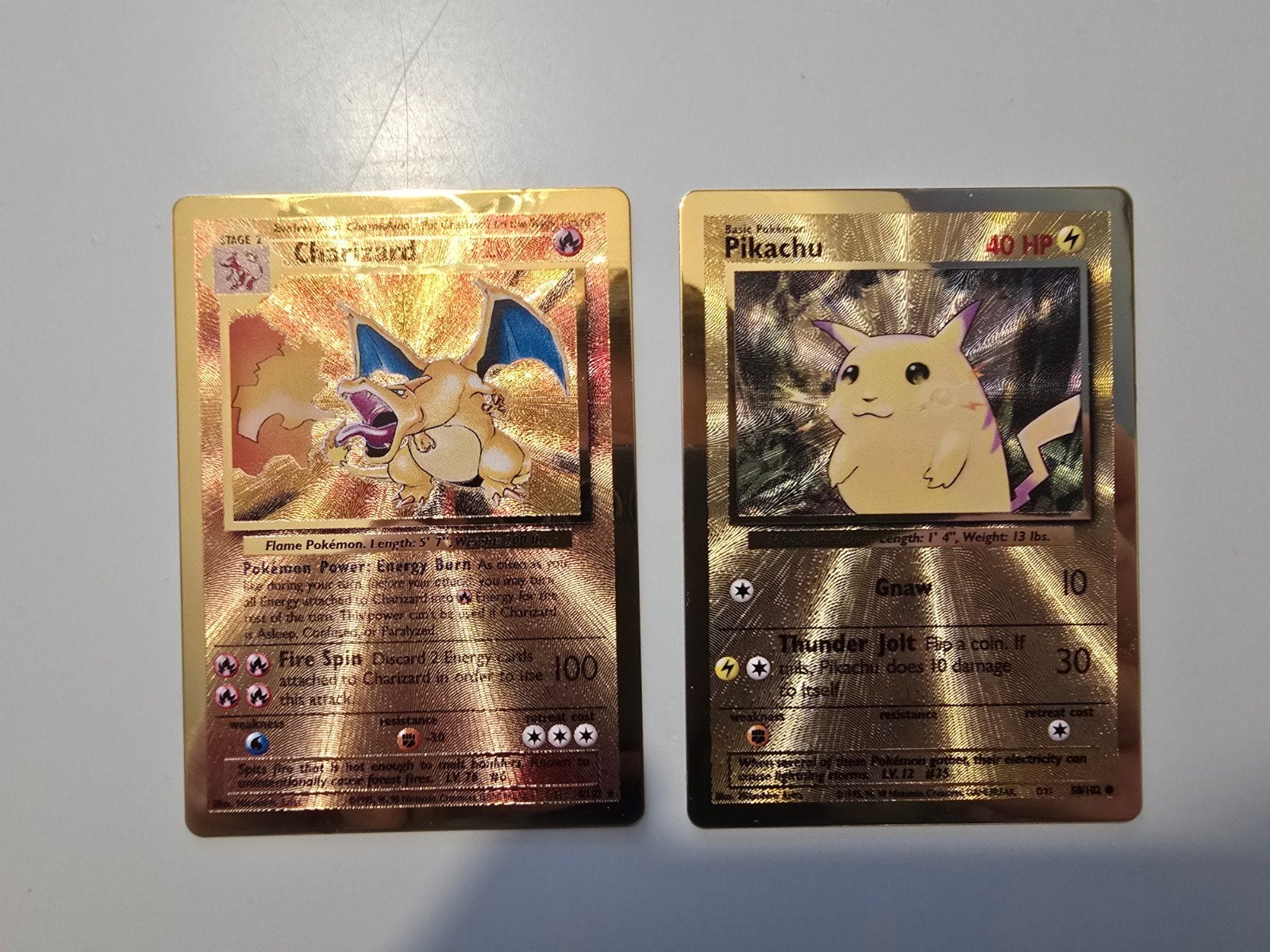 Metal Pokémon kaarten: Charizard en Pikachu (Celebrations), Hobby en Vrije tijd, Verzamelkaartspellen | Pokémon, Ophalen of Verzenden