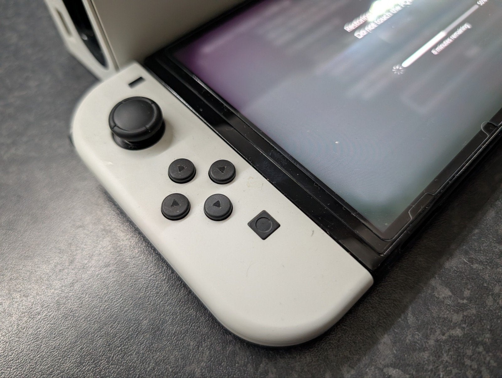 Foto 6 van Nintendo Switch OLED + 5 Fysieke Games (Mario Kart 8, Switch