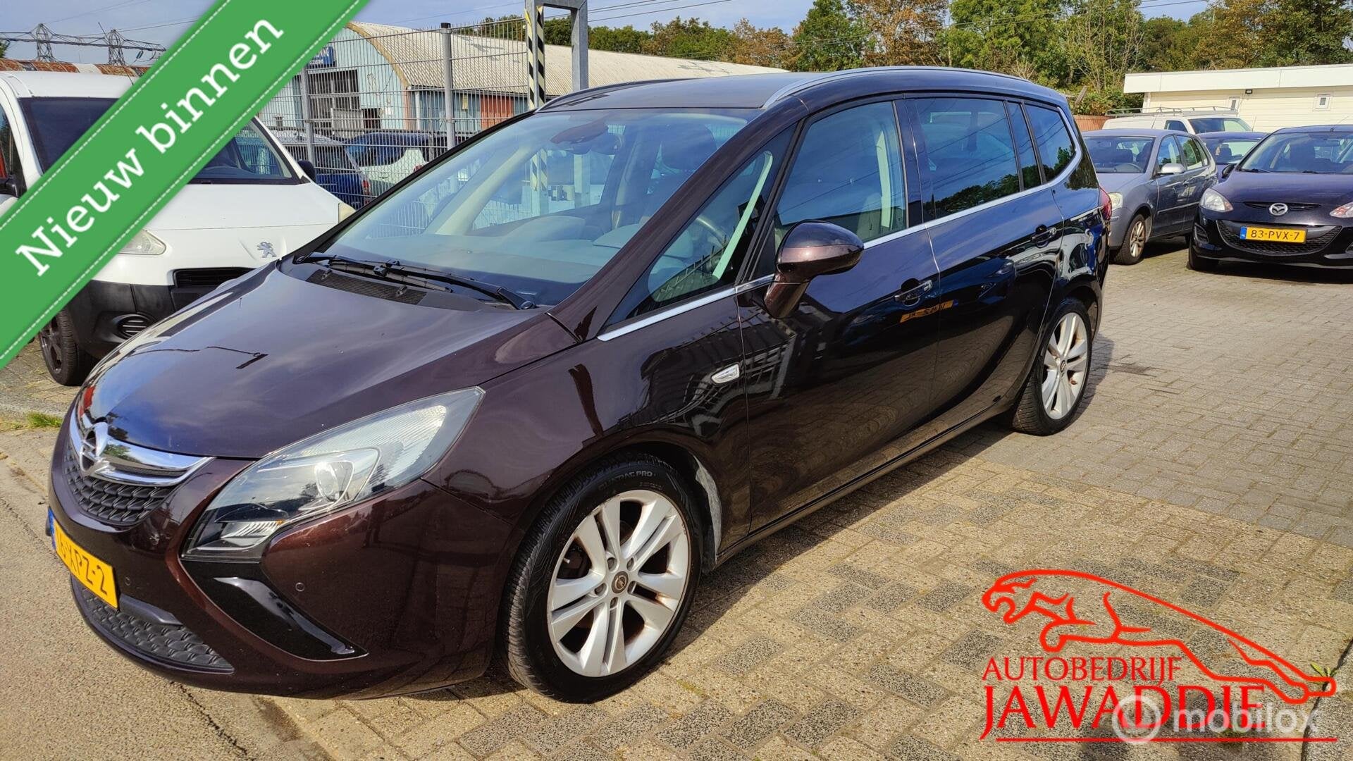Opel Zafira Tourer 1.4 Cosmo 7p. APK TOT 10-03-2027, Auto's, 4 cilinders, Bruin, 7 stoelen, Origineel Nederlands