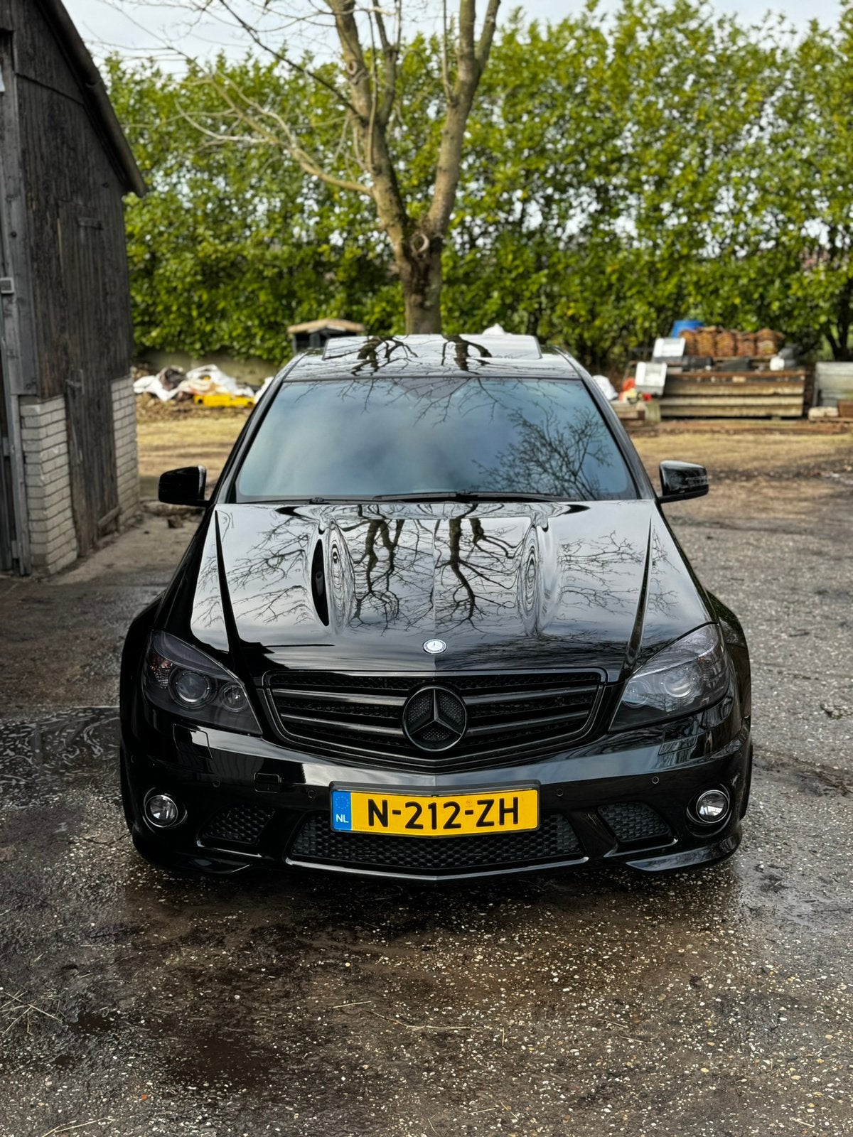 Mercedes-Benz C-Klasse 6.2 C63 AMG Sedan AUT 2011 Zwart, Auto's, Automaat, Achterwielaandrijving, 457 pk, Leder en Stof