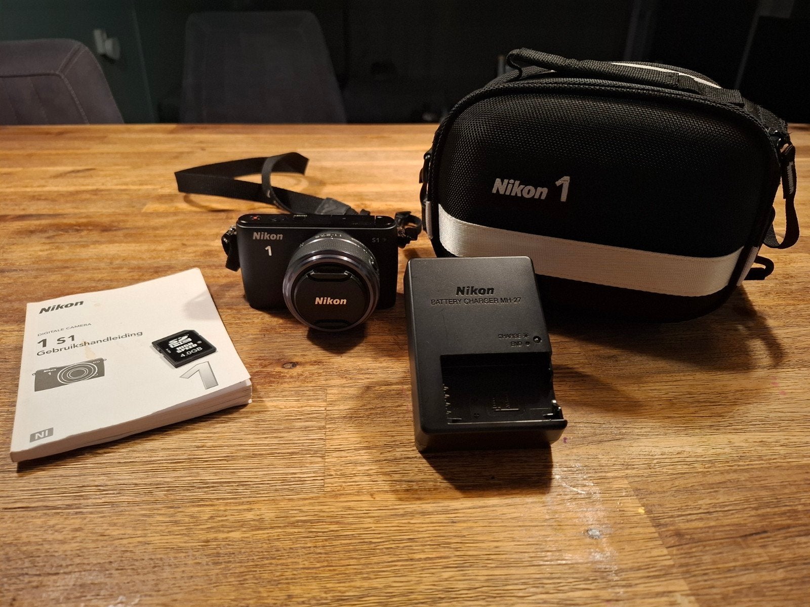 Nikon 1 S1 Systeemcamera met 11-27.5mm lens, Audio, Tv en Foto, Fotocamera's Digitaal, Geheugenkaart, Gebruikt, Ophalen of Verzenden