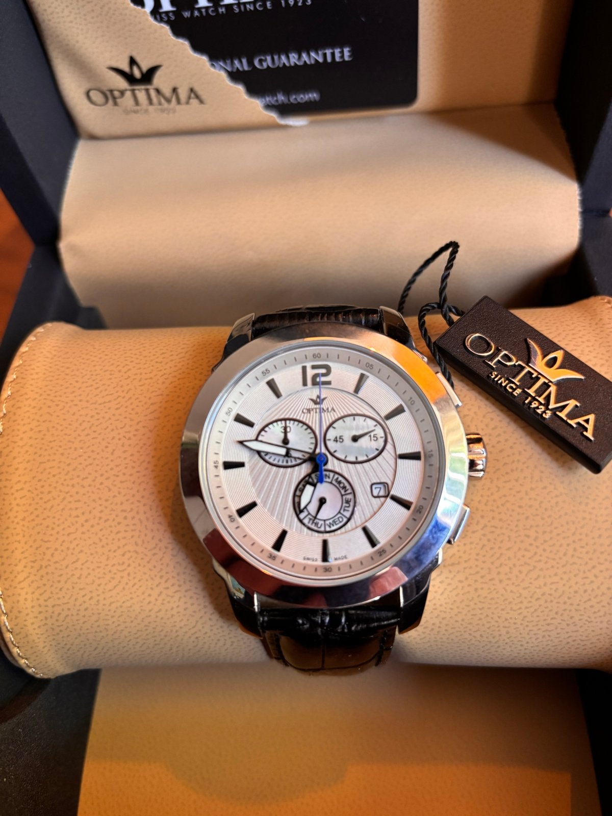 Optima Zwitsers Quartz Horloge,Nieuw met fabrieksgarantie., Overige merken, Leer, Staal, Verzenden