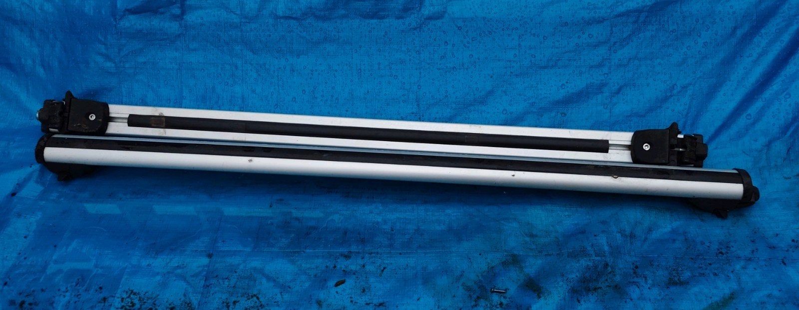 Universele aluminium dakdragers open rail, Ophalen