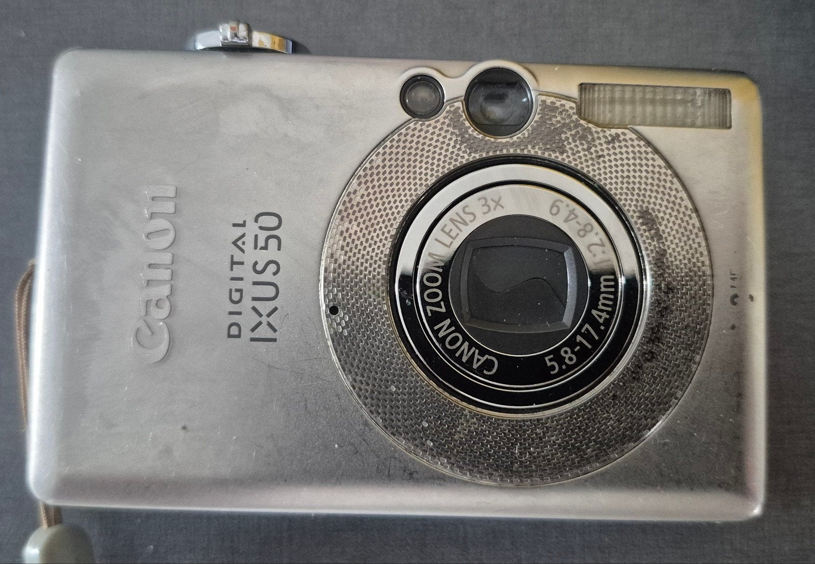 Canon Digital IXUS 50 Compactcamera met oplader en tasje, Audio, Tv en Foto, Fotocamera's Digitaal, Gebruikt, Compactcamera, Canon