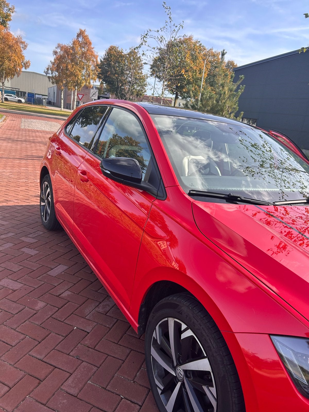 Volkswagen Polo 1.0 TSI 70KW 5D 2018 Rood, Voorwielaandrijving, 40 €/maand, Leder en Stof, Origineel Nederlands