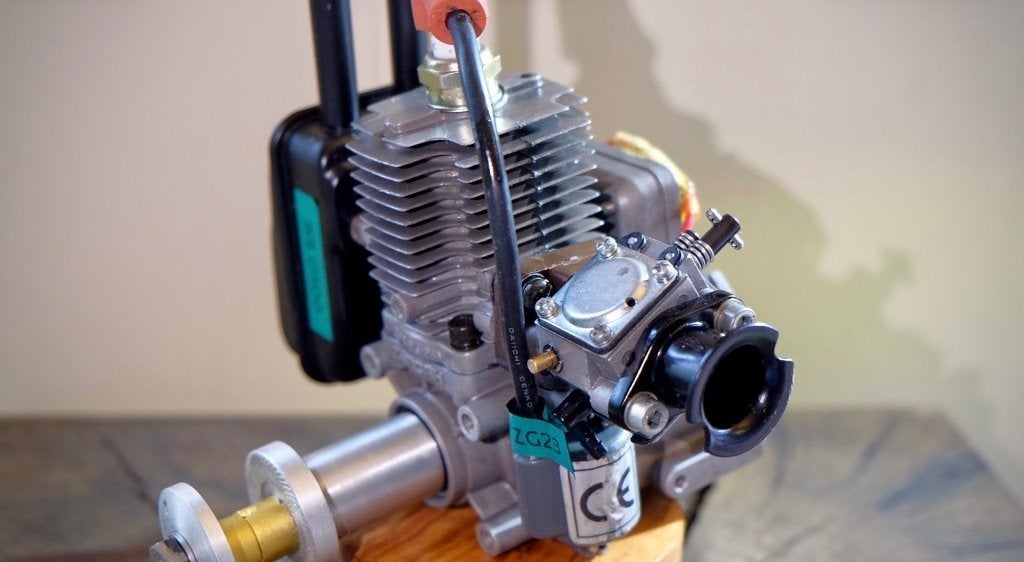 Zenoah ZG23 – 23cc benzinemotor – net ingelopen, Hobby en Vrije tijd, Overige merken, Ophalen of Verzenden, Zo goed als nieuw