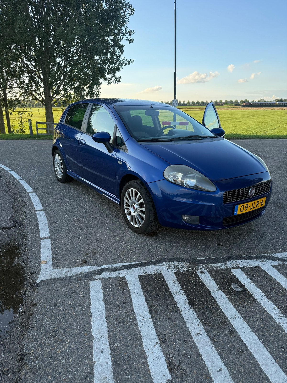 Fiat Punto Grande 1.4 5-Deurs  2009 Blauw sportieve uitv., Voorwielaandrijving, Stof, 40 €/maand, 4 cilinders