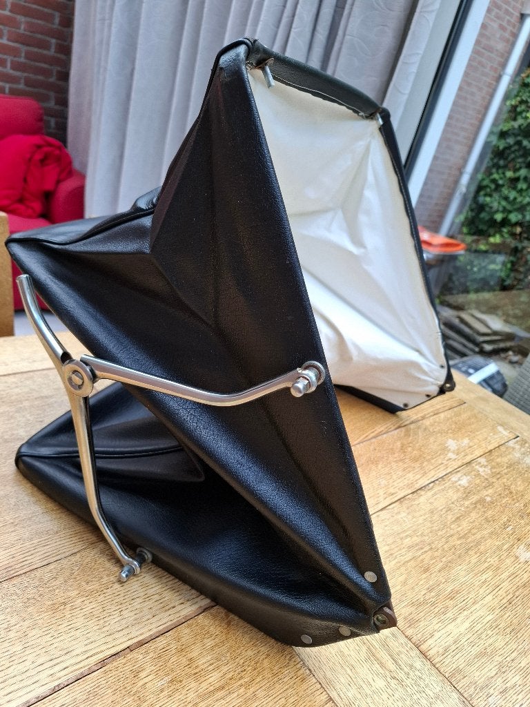 Kap van een vintage kinderwagen, Ophalen