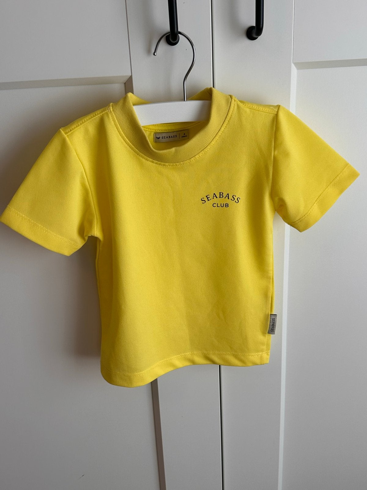 Seabass UV shirt geel maat 104 (valt kleiner), Ophalen of Verzenden, Zo goed als nieuw, Jongen of Meisje, Sport- of Zwemkleding