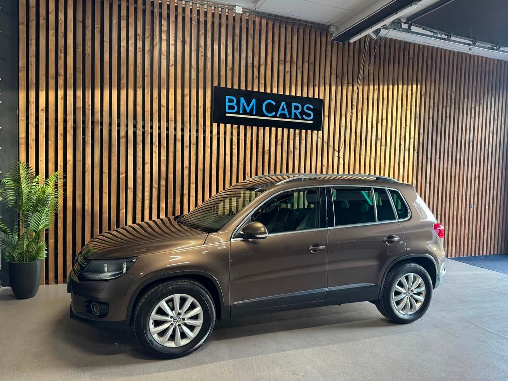 Volkswagen Tiguan 1.4 TSI Sport&Style DSG, Trekhaak, Cruise, Euro 5, 4 cilinders, Bruin, Alcantara