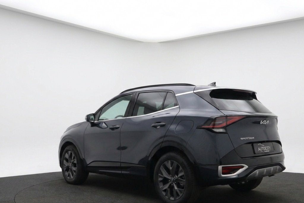Kia Sportage 1.6 T-GDi Hybrid 230PK GT-PlusLine l PANO l 360, Auto's, Gebruikt, 4 cilinders, Zwart, Leder