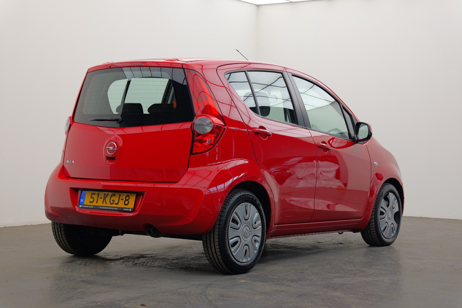 Opel Agila 1.2 Enjoy | Automaat | Airconditioning | 6 maande, Auto's, 4 cilinders, Met garantie (alle), Bedrijf, Grijs