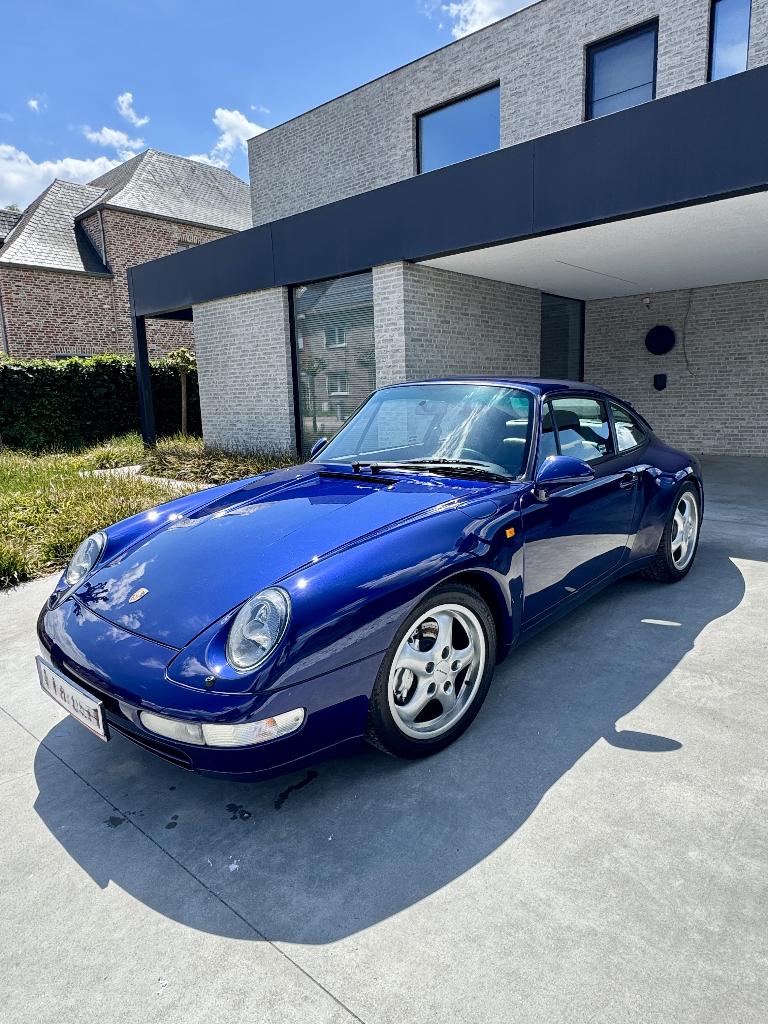 Porsche 993 Carrera 4 uit 1995, origineel Belgische wagen, Auto's, Porsche, Zwart, Blauw, 272 pk, Handgeschakeld