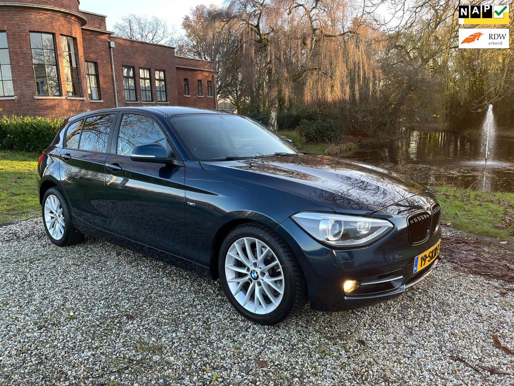 BMW 1-serie 118i Business 5-deurs AUTOMAAT/xenon/NAVI, Auto's, BMW, Euro 5, Achterwielaandrijving, Gebruikt, 4 cilinders