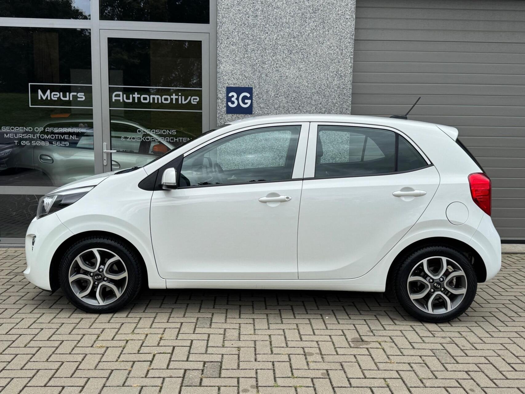 Kia Picanto 1.0 CVVT DynamicPlusLine Cruise/Camera/Navi/CarP, Auto's, Stof, Gebruikt, 4 stoelen, Wit