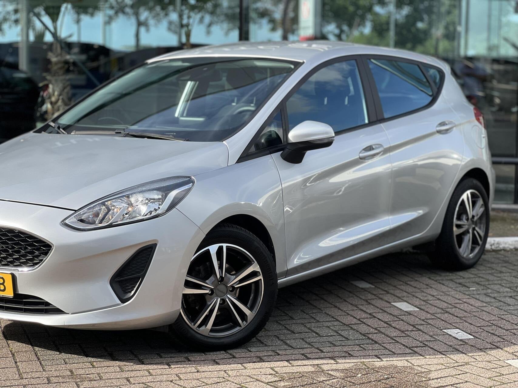 Ford Fiesta 1.1 Trend Airco cruise Navi AllSeason NAP, Auto's, Voorwielaandrijving, Dealer onderhouden, Stof, Gebruikt