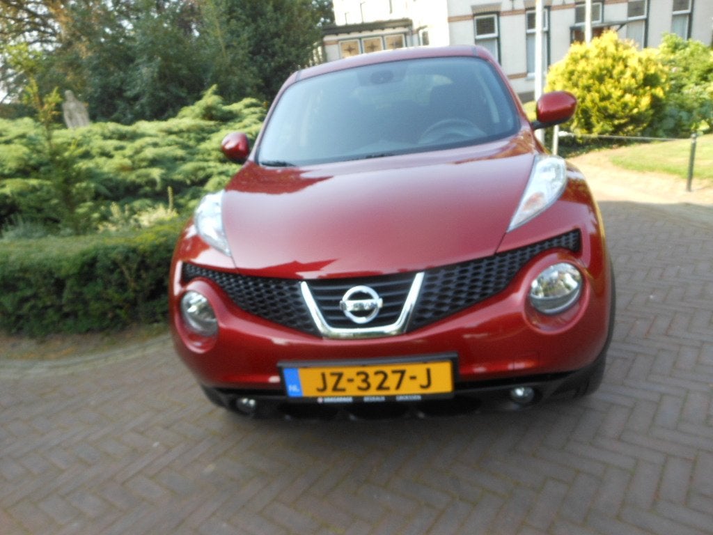 NISSAN Juke 1.6 117pk Tekna bij Vakgarage met 12 maanden B, Auto's, Nissan, Voorwielaandrijving, 12 maanden, Stof, Zwart