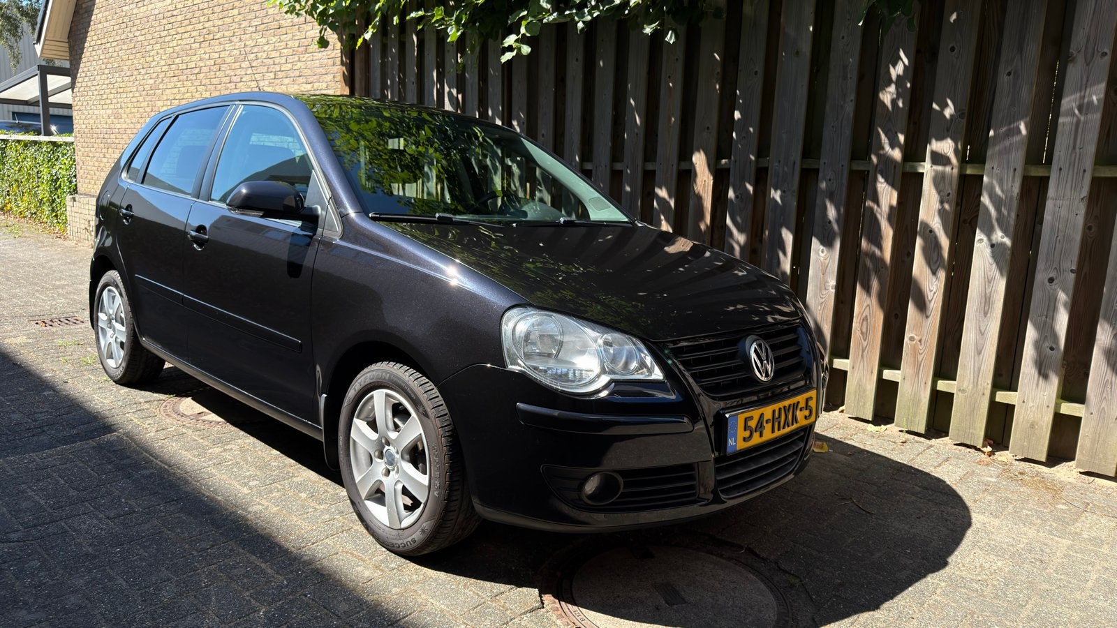 Volkswagen Polo 1.4 16V 59KW 2009 Zwart, Voorwielaandrijving, Stof, 40 €/maand, Zwart