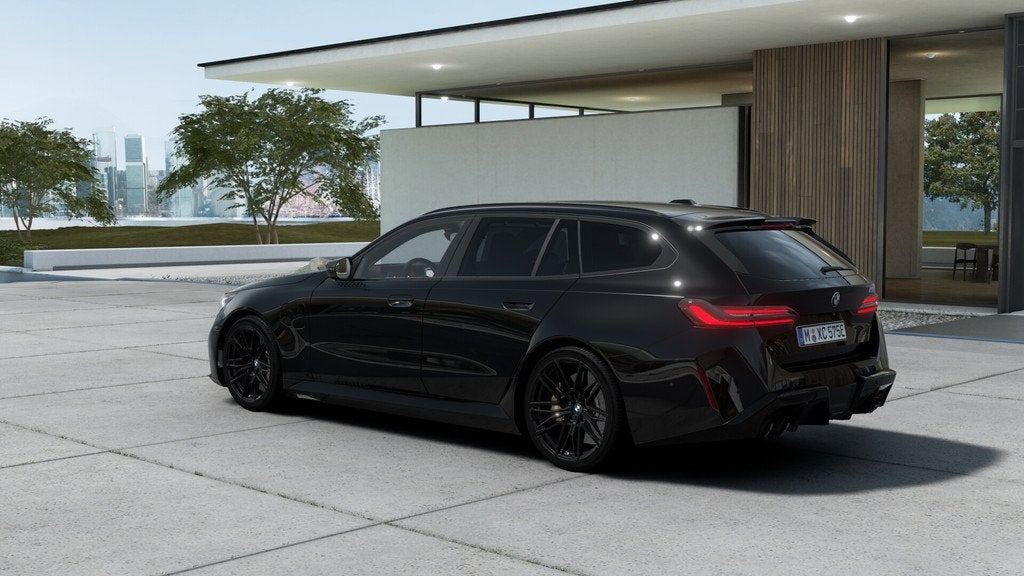BMW 5 Serie Touring M5 Automaat / M Drive Professional / Bow, Auto's, BMW, 4395 cc, Zwart, Leder, Hybride Elektrisch/Benzine