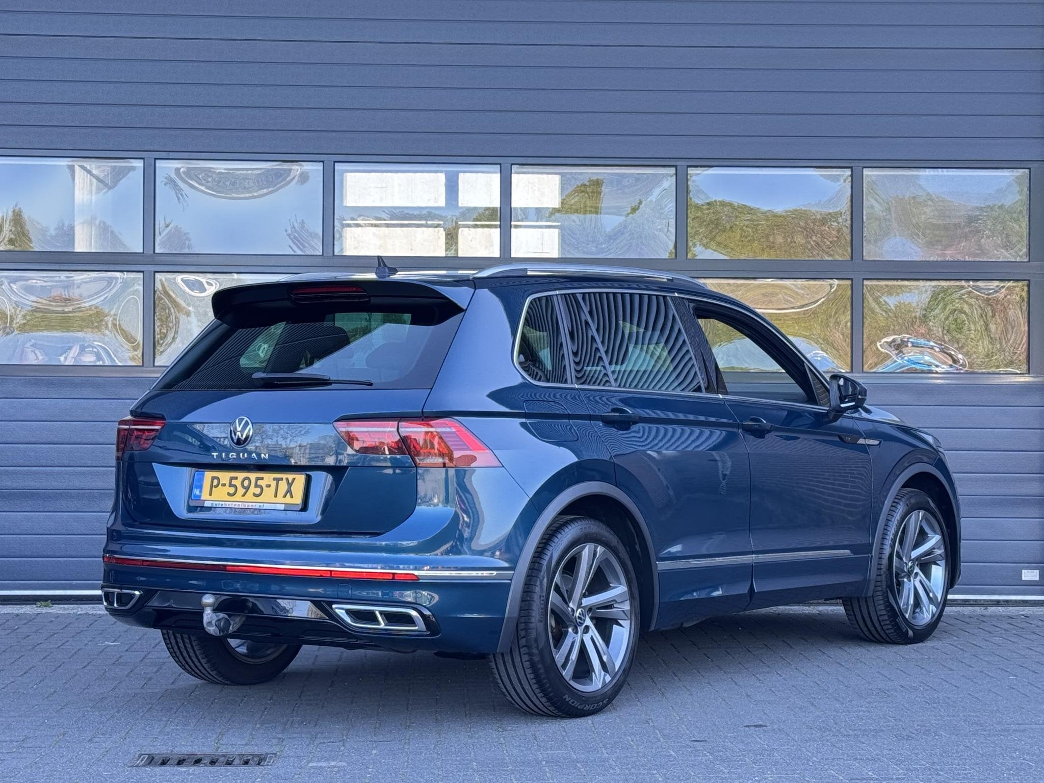 VOLKSWAGEN TIGUAN 1.5 TSI R-LINE BUSINESS+ I AUTOMAAT I TREK, Stof, 4 cilinders, Blauw, Origineel Nederlands