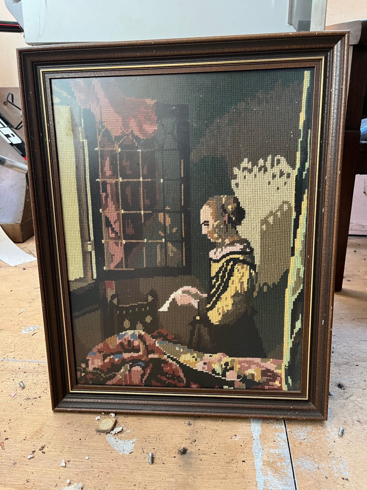 Geborduurd schilderij hout, Ophalen