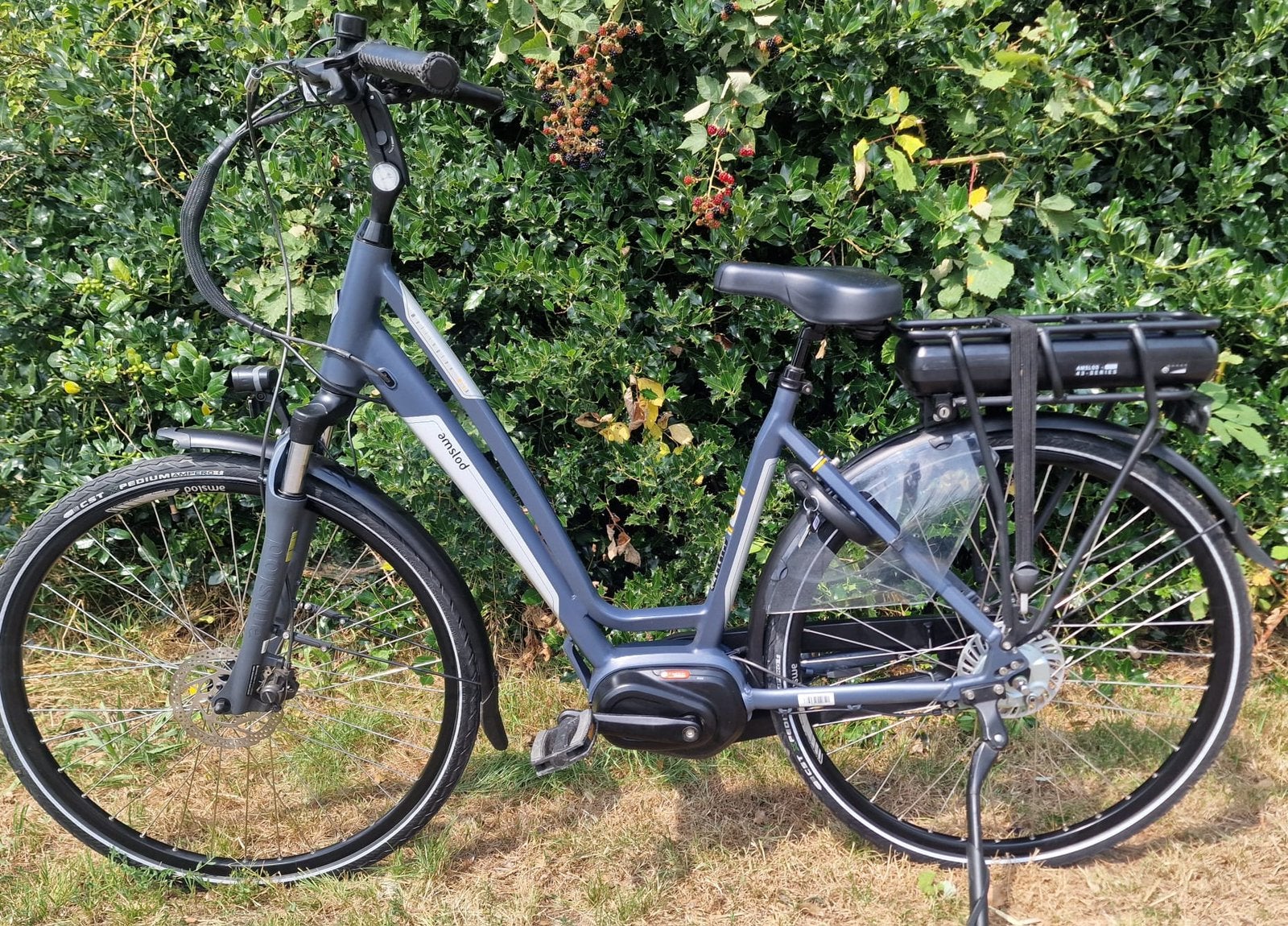 Amslod Wellinghton middenmotor, 600 wh accu., Zo goed als nieuw, 51 tot 55 cm, 50 km per accu of meer, Ophalen