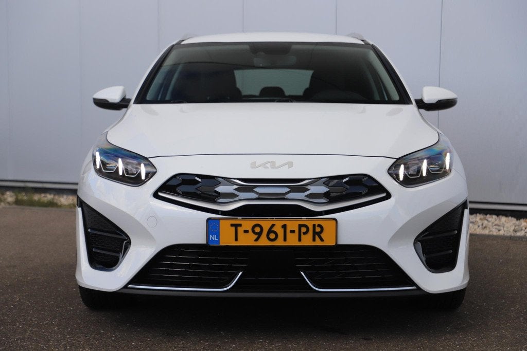 Kia Ceed Sportswagon 1.6 GDI PHEV DynamicPlusLine 18 inch LM, Gebruikt, Met garantie (alle), Leder en Stof, Wit