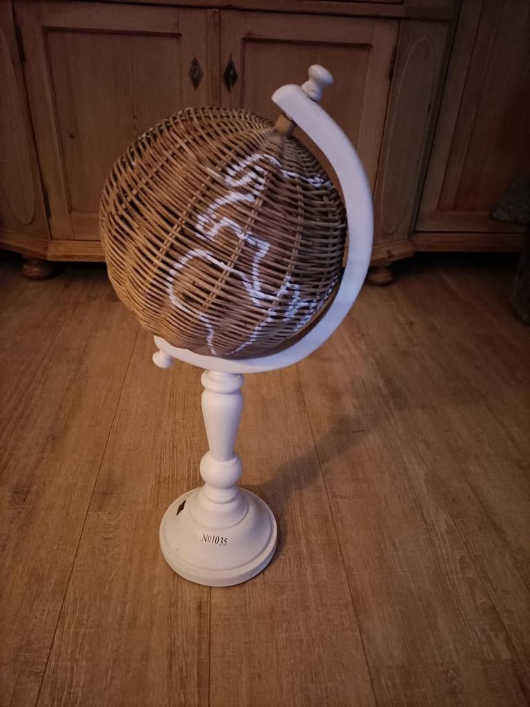 Rotan wereldbol Riviera Maison, Ophalen