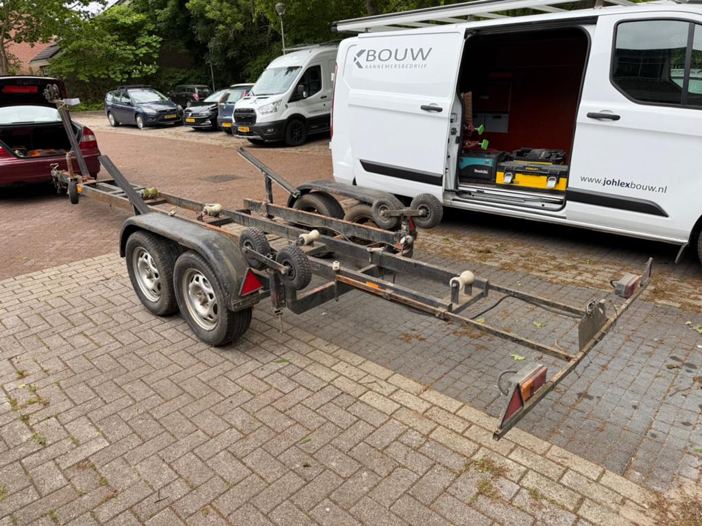 Dubbelassige boottrailer! Moet snel weg!, Watersport en Boten, Boottrailers, Ophalen, Gebruikt, 1500 tot 3000 kg, 9 meter of meer
