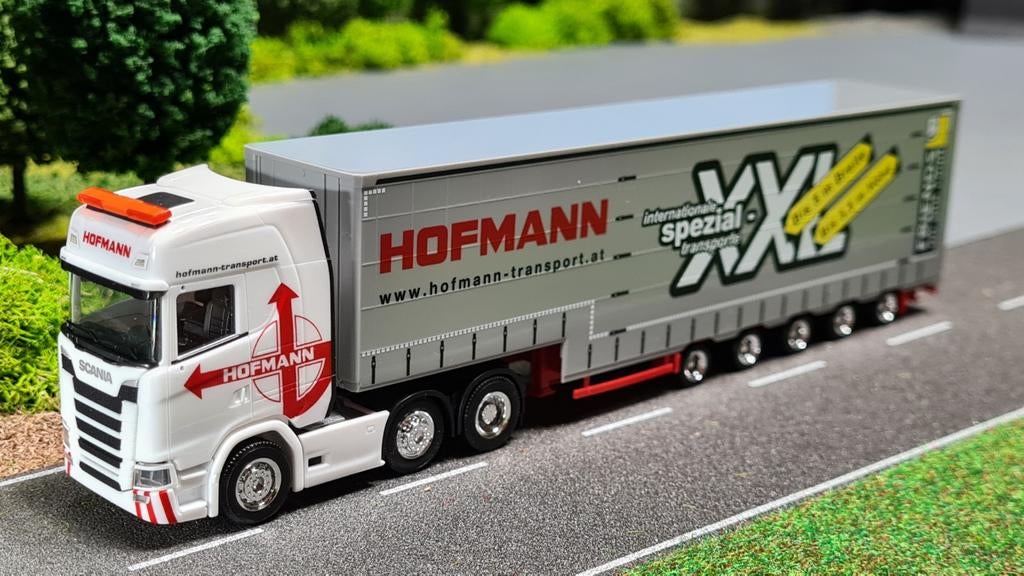 030 Herpa Hofmann Scania S HL Meusburger dieplader, Hobby en Vrije tijd, Modelauto's | 1:87, Ophalen of Verzenden, Nieuw, Bus of Vrachtwagen